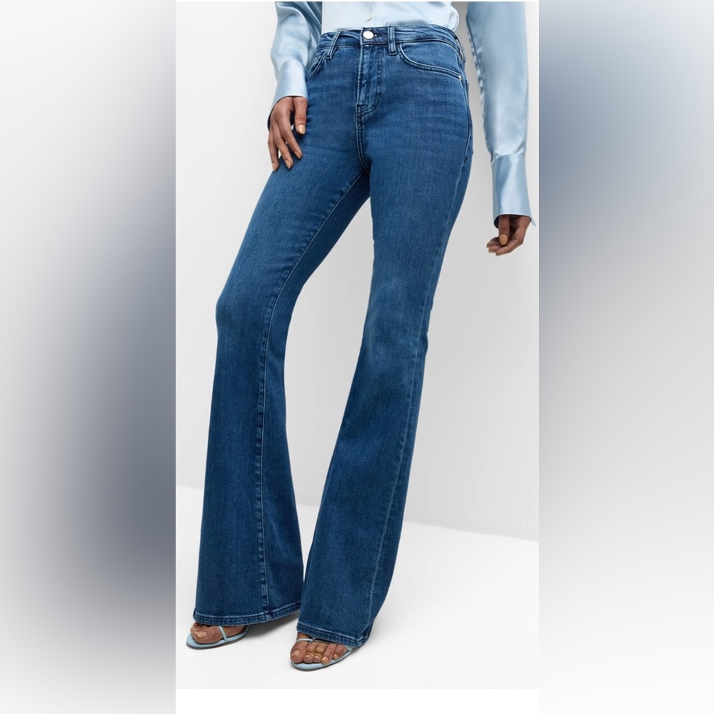 ZARA flared jeans with a mid waist. Size US S .Rarely worn like new